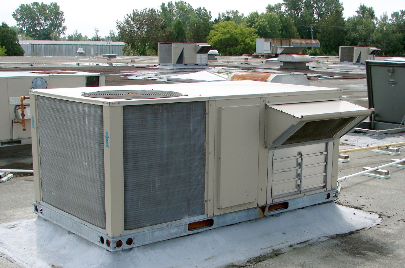 Packaged rooftop HVAC units on a commercial roof