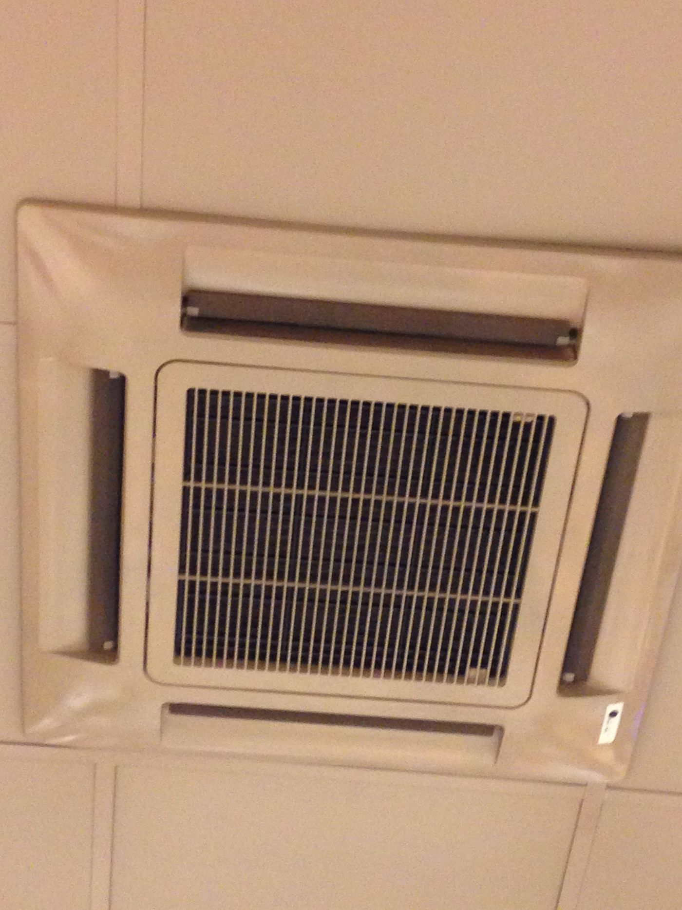 Ceiling cassette air conditioner in a small business